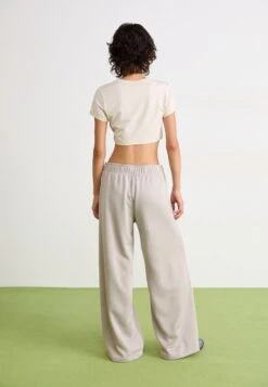 Nike Sportswear WIDE LEG TRACK - Tracksuit Bottoms - College Grey/white/black -Friboo Verkauf Geschaft 16a447c99c8343d3bf7fd8cdd7e4fcd2