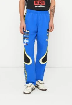 Adidas Originals GFX TRACK PANT UNISEX - Tracksuit Bottoms - Blue/black/white