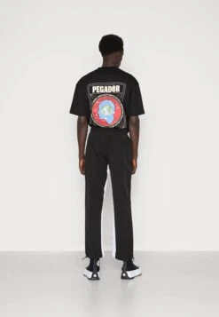Pegador DEMERE WIDE TRACK PANTS UNISEX - Jogginghose - Black/white -Friboo Verkauf Geschaft ee4f0d2f9c7b4bd2bcbd00eeac6ff4de